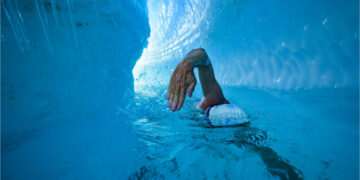 ‘Speedo diplomacy’: the climate campaigner who swims with icebergs