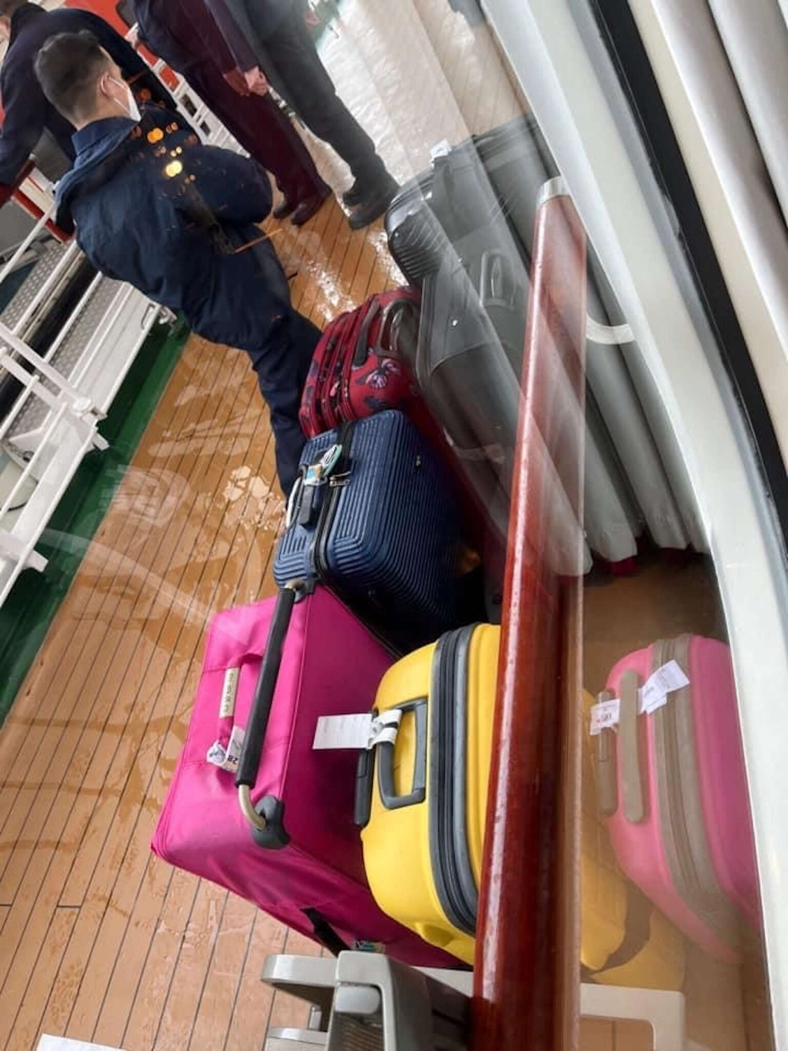 Shocked holidaymakers watch soaked suitcases in sea after cruise