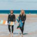 Surfers offer free wooden bellyboards to cut plastic pollution