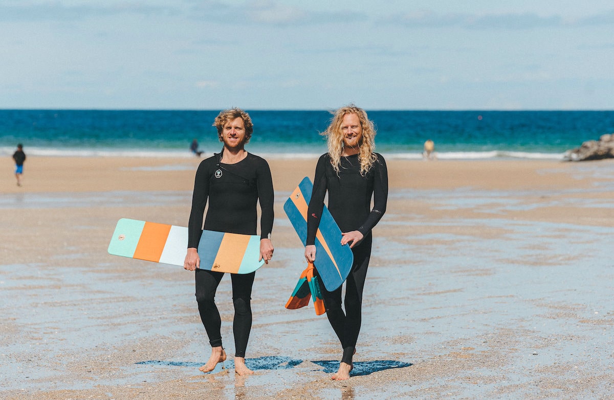 Surfers offer free wooden bellyboards to cut plastic pollution