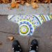 The guerrilla artist filling Europe’s potholes with colourful mosaics