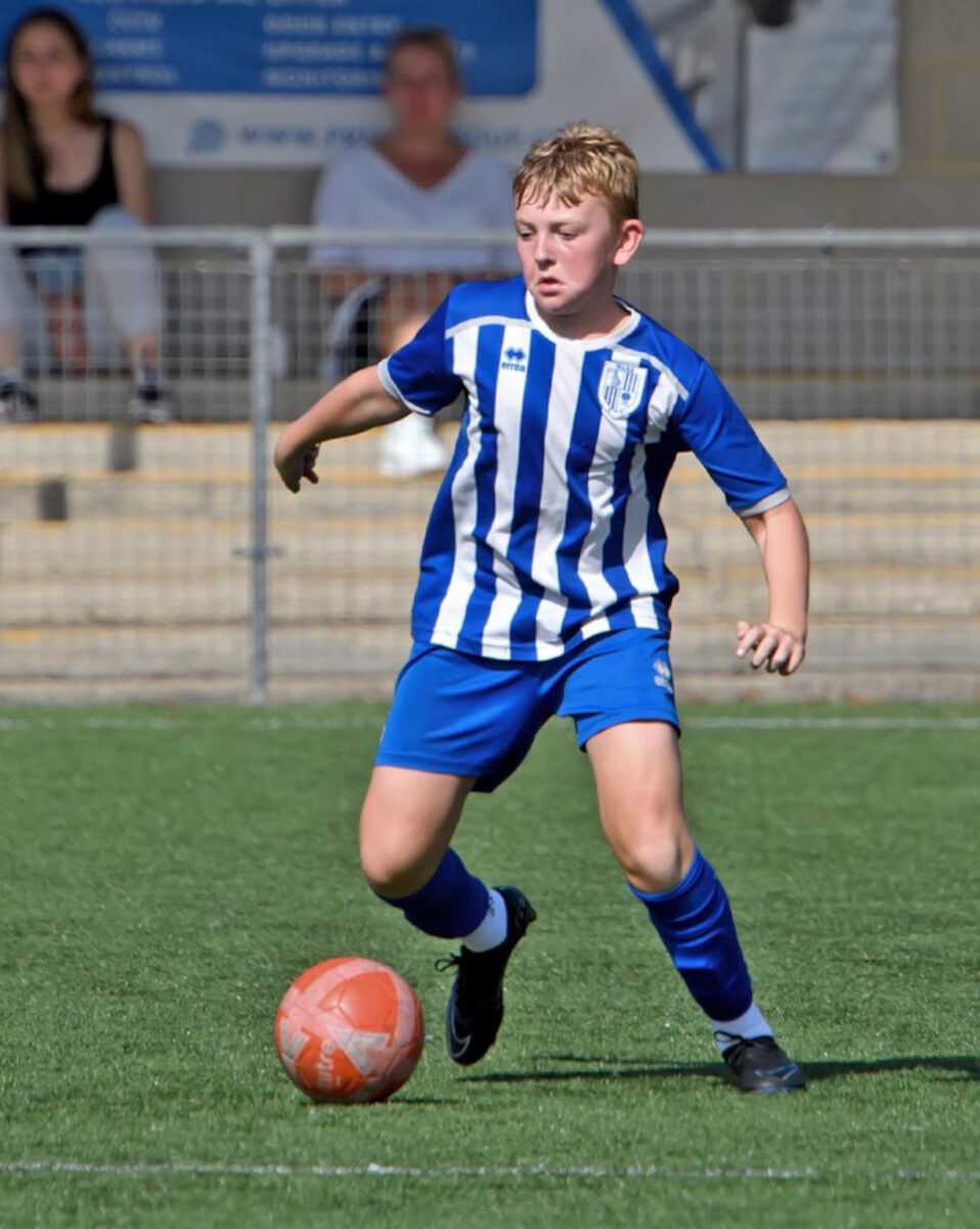 Youngster fighting for life being struck by lightning playing football