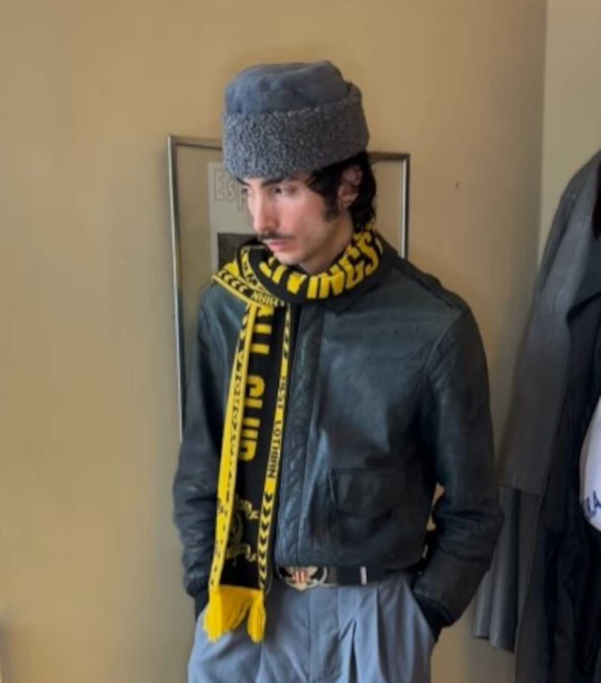 Gustavo Piers Milton sports the Livingston scarf
