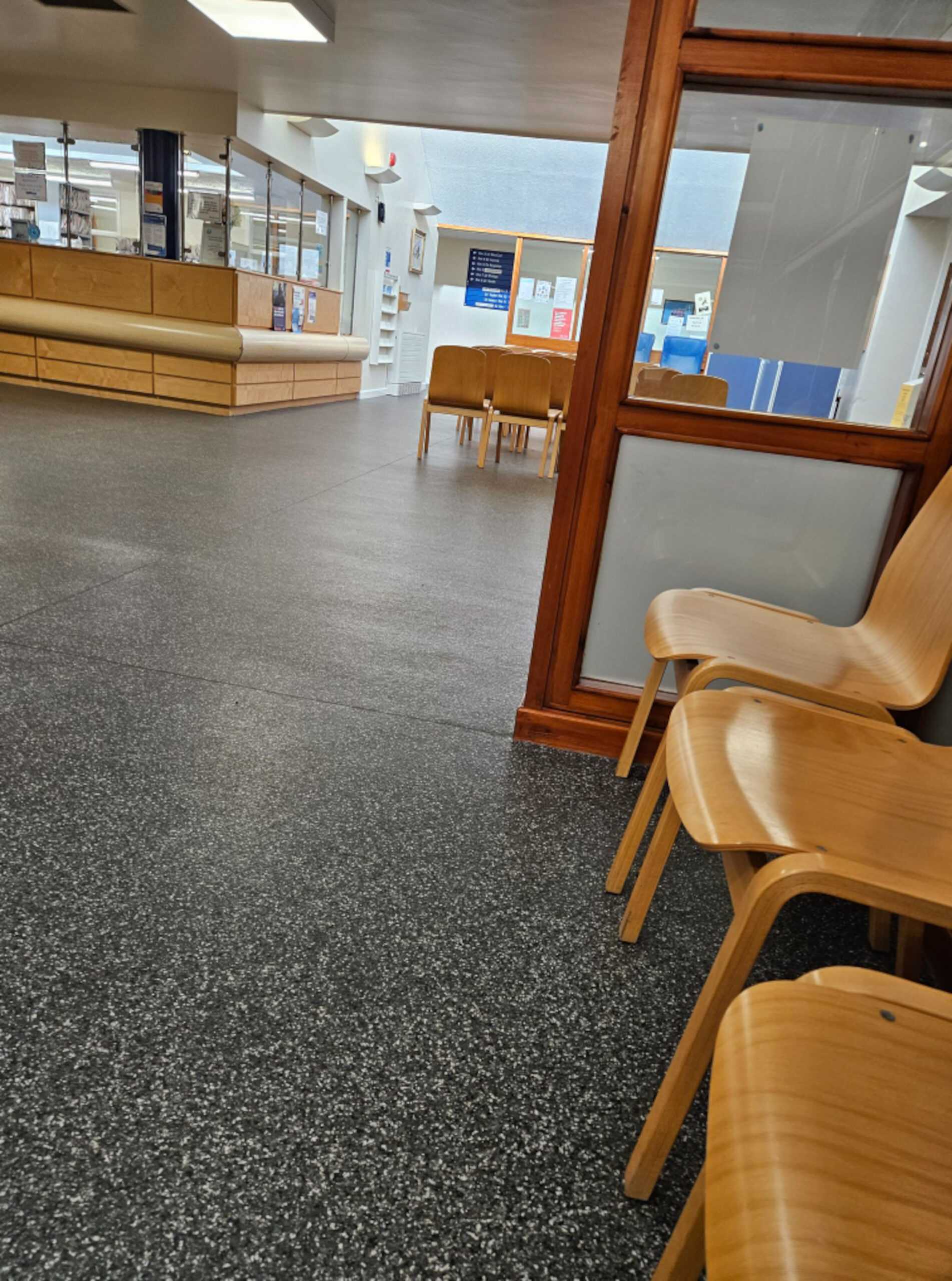 Not even a receptionist can be seen in the photo of the deserted health centre.