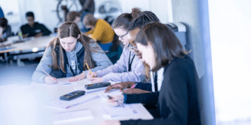 School pupils solving maths calculations