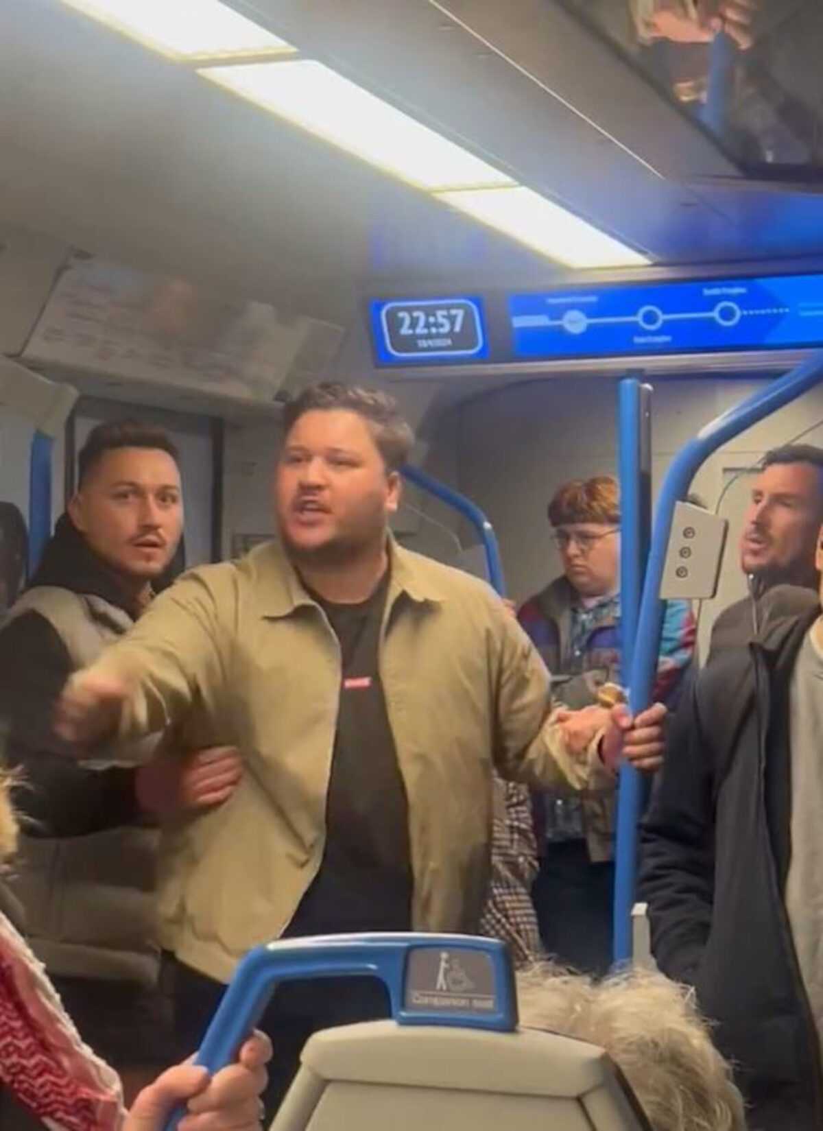 Shocking footage as train passengers abused by group of men