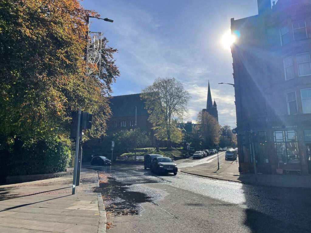 Repairs take place on manhole cover leaking water onto road in Edinburgh