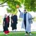 New University of Stirling graduates Heather Gibson (left), from Glasgow, and Robyn MacPherson, from Livingston, shared graduation day with Scottish basketball great Kieron Achara. Heather, 28, and Robyn, 32, graduated with a BA (Hons) Professional Education (Primary) © Stirling University