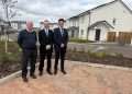 An image of Midlothian Council’s Cabinet Member for Housing, Cllr Stuart McKenzie pictured in the centre with Cruden Development Director Paul Doran on the right and Construction Manager with Cruden, Frank Gallagher on the left.