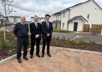 An image of Midlothian Council’s Cabinet Member for Housing, Cllr Stuart McKenzie pictured in the centre with Cruden Development Director Paul Doran on the right and Construction Manager with Cruden, Frank Gallagher on the left.