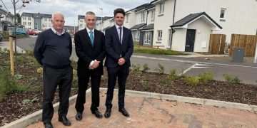 An image of Midlothian Council’s Cabinet Member for Housing, Cllr Stuart McKenzie pictured in the centre with Cruden Development Director Paul Doran on the right and Construction Manager with Cruden, Frank Gallagher on the left.